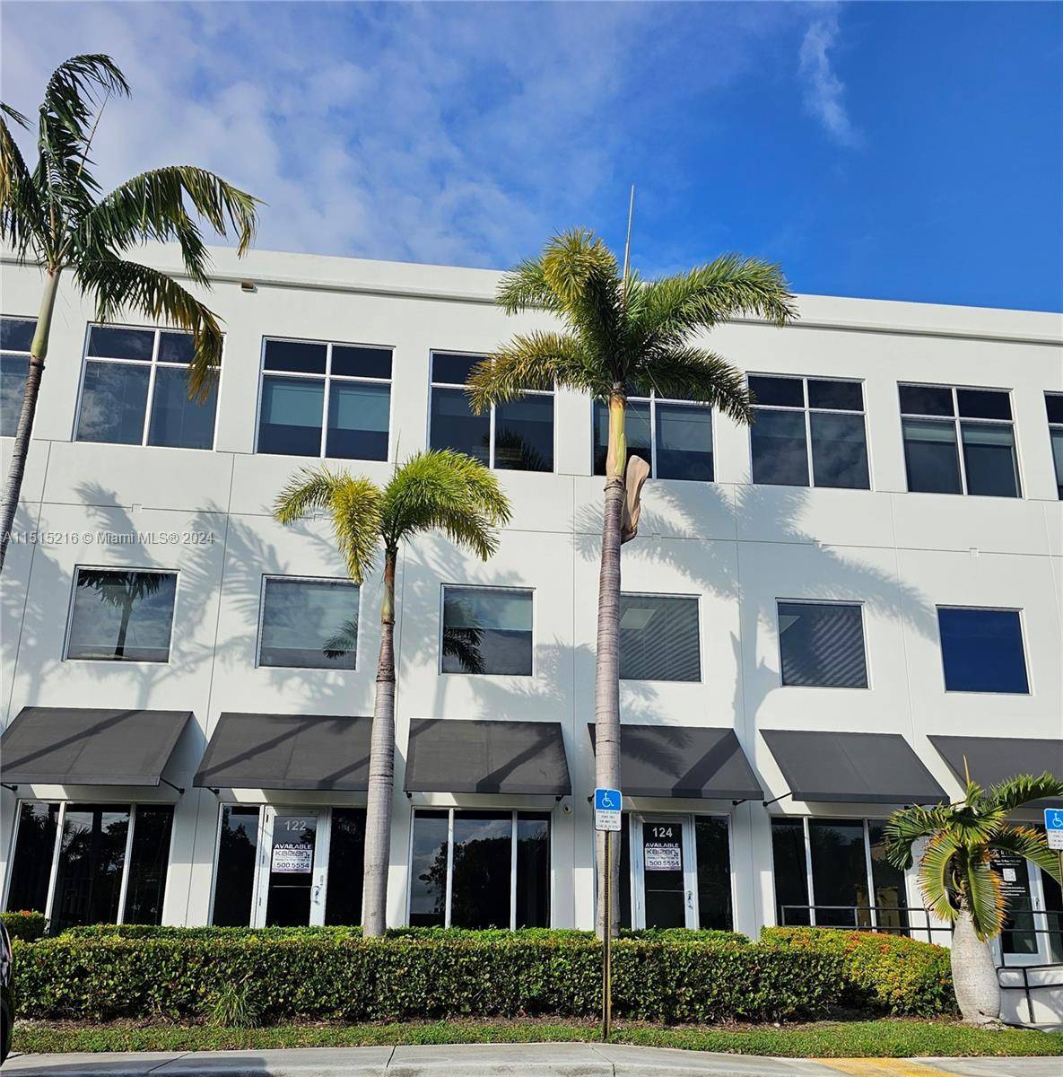 This ground floor office space 122 features beautiful floor to ceiling glass windows and doors, an open floor plan, and modern finishes.