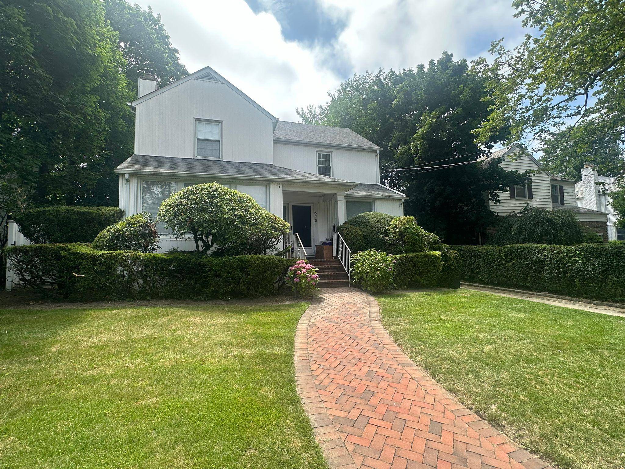 Spacious Center Hall Colonial Nestled on a quiet residential street in the sought after Woodmere Academy section, this expansive Center Hall Colonial offers 4 bedrooms and 3 full bathrooms, combining ...