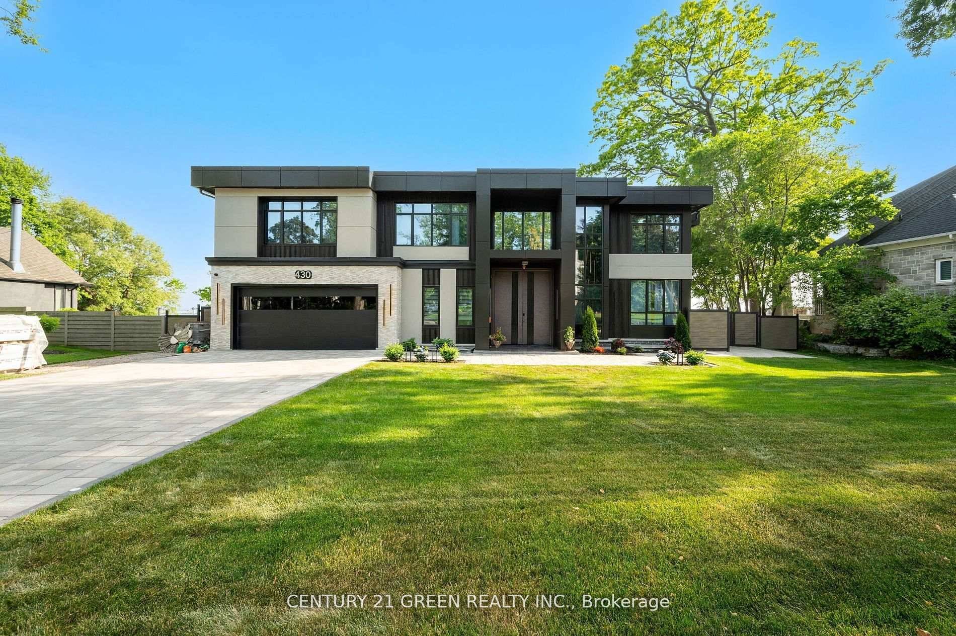 Lakefront newly custom built home feels like a retreat, completed in November 2024, offering over 6, 350 sq ft of total living space across three levels with gorgeous panoramic water ...