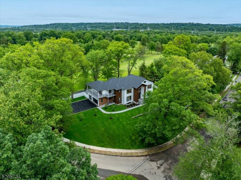 Welcome to 60 Baker Road, a stunning custom built home at the top of a peaceful cul de sac, offering all the privacy you desire.