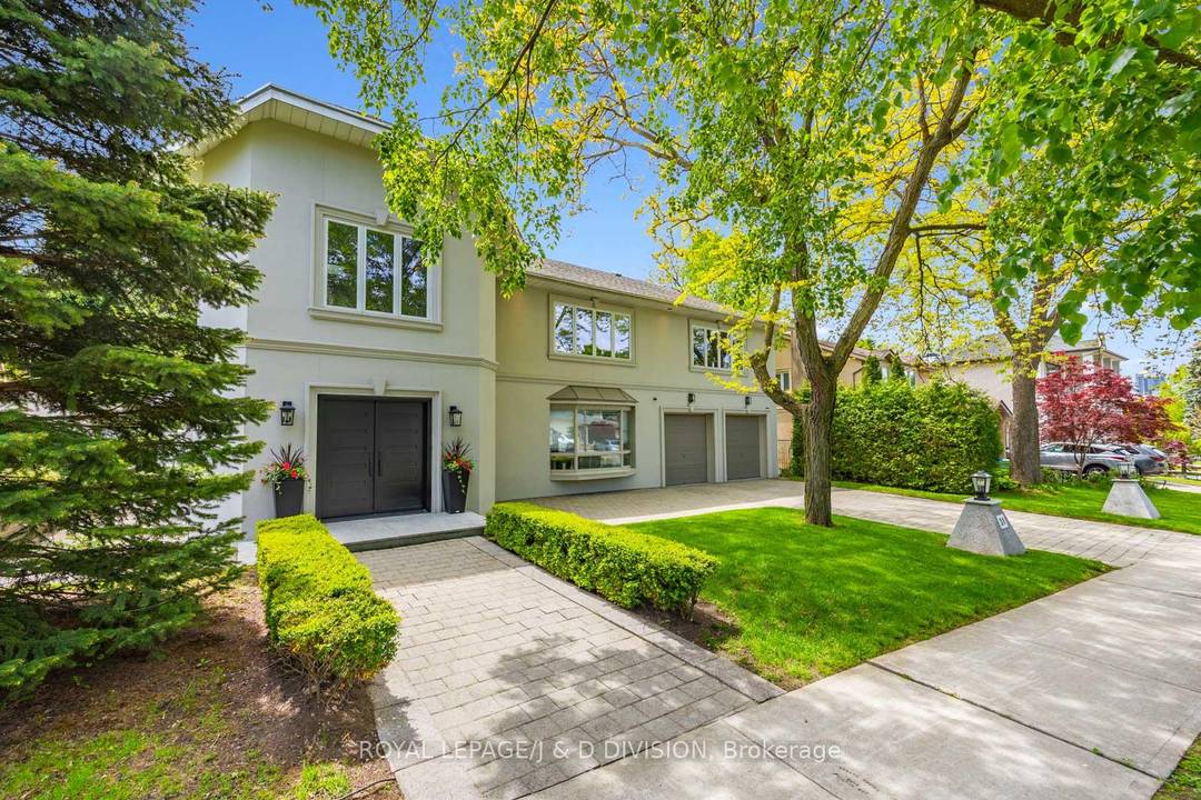 Beautifully situated in Henry Farms on a gorgeous tree lined street this handsome, spacious family home was rebuilt in 1994 by the present owners.