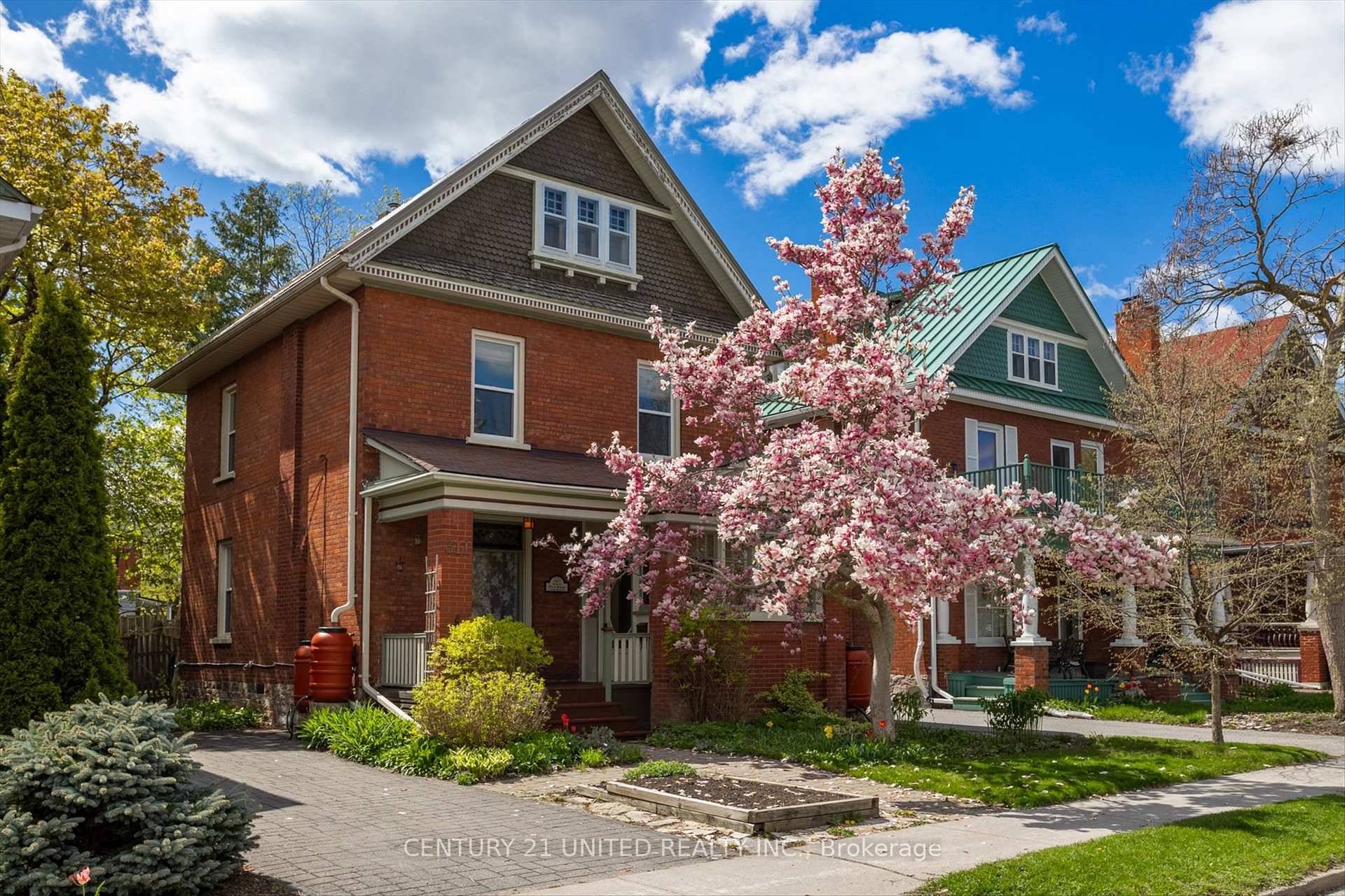 Walk past the mature Magnolia tree out front through the enclosed front porch to the original antique front door of this lovely century home in the highly desirable Heritage Designated ...