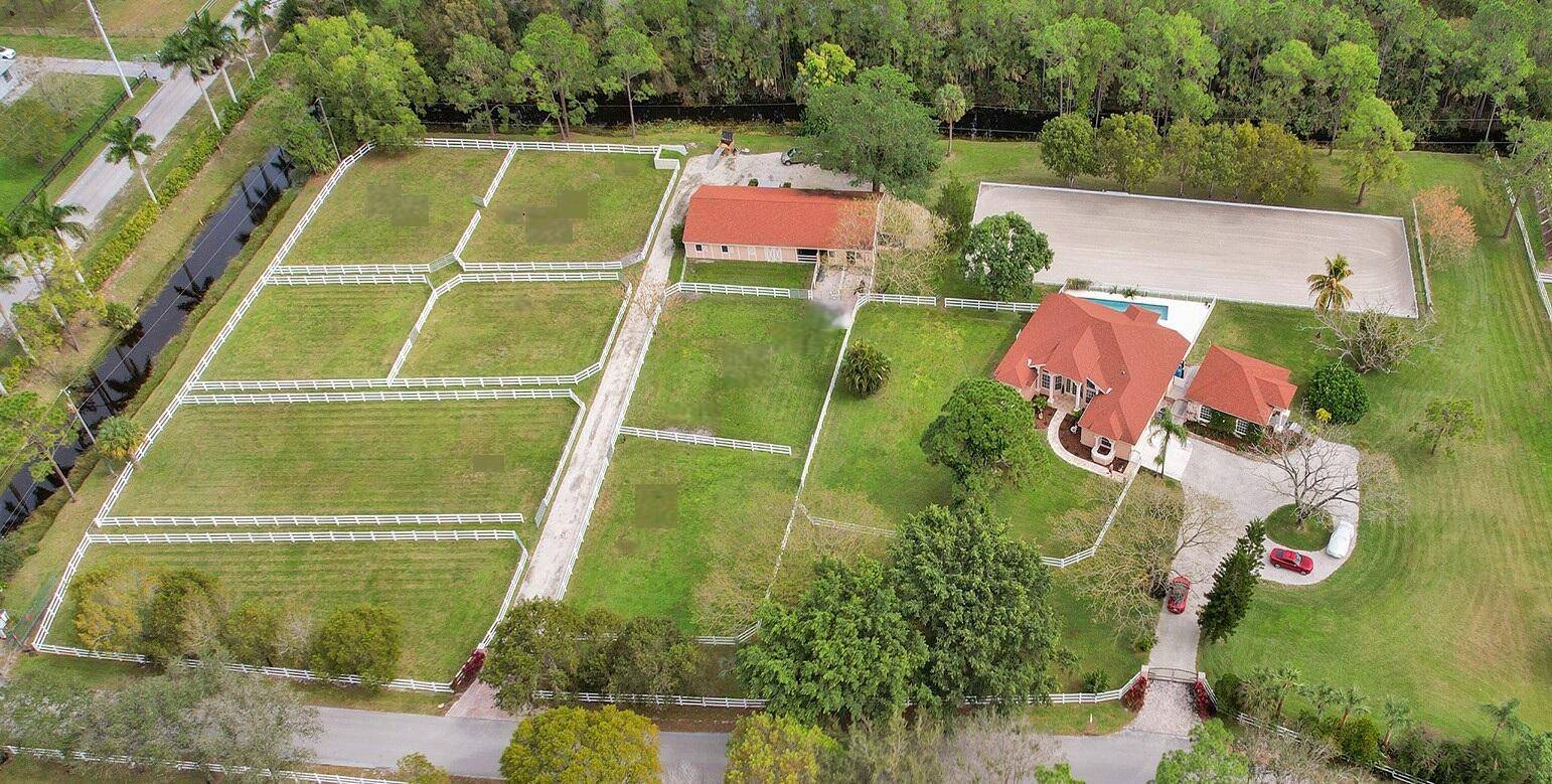 REDUCED PRICE Beautiful Equestrian Estate on 6 1 2 Acres of park like paradise.