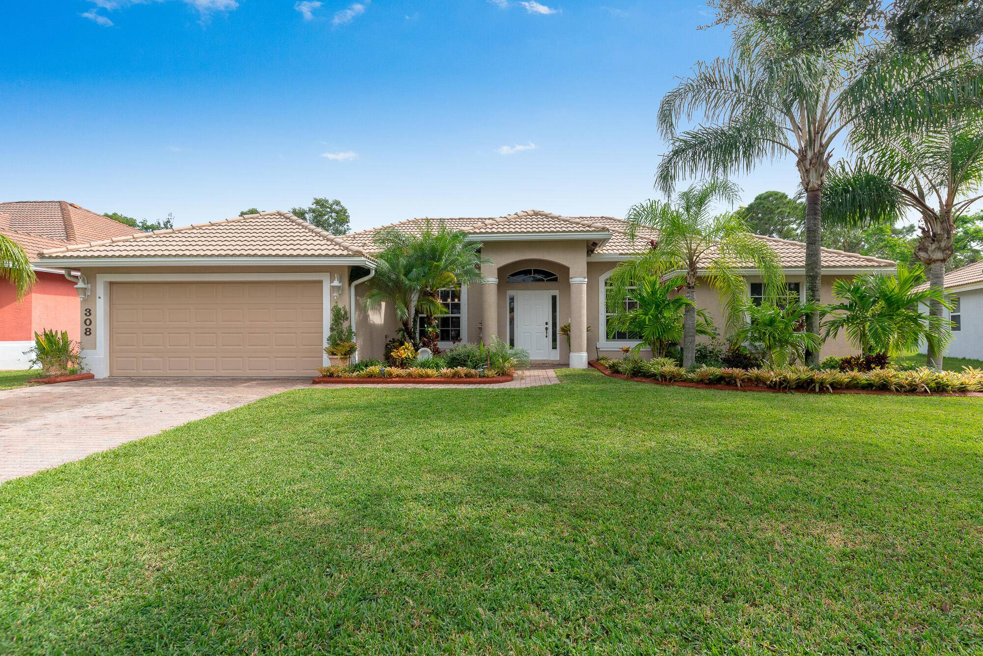 Located in the desirable gated community of Sawgrass Lakes Sanctuary, this stunning home offers 2, 016 sq.