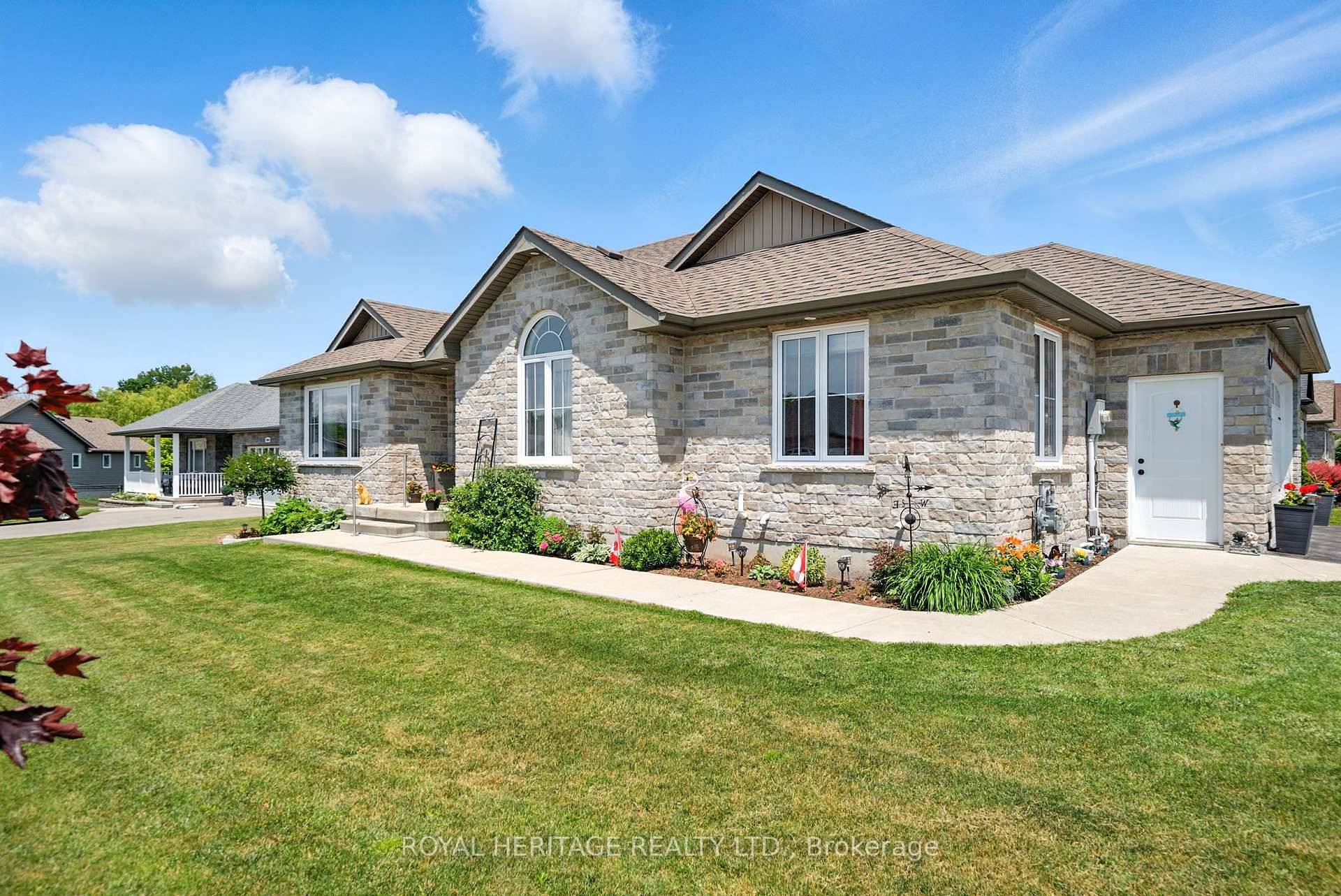 Discover this charming brick bungalow at 47 Arthur Street in the sought after Colborne Creek subdivision.