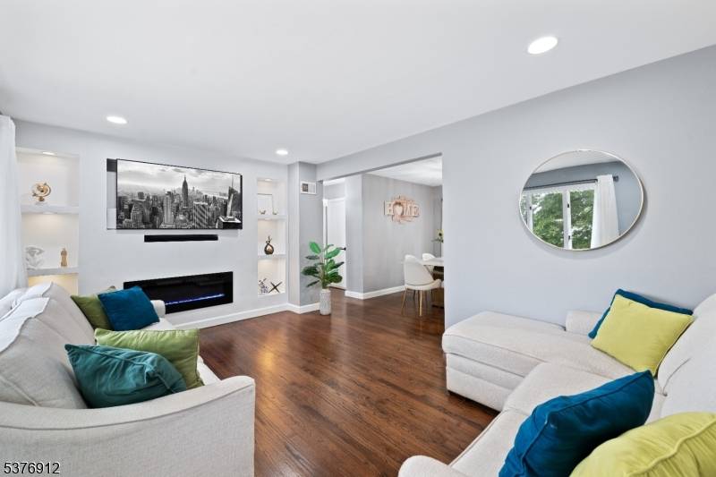 Welcome to this beautifully expanded Cape Cod in the sought after Greg Lawn section of Clifton !