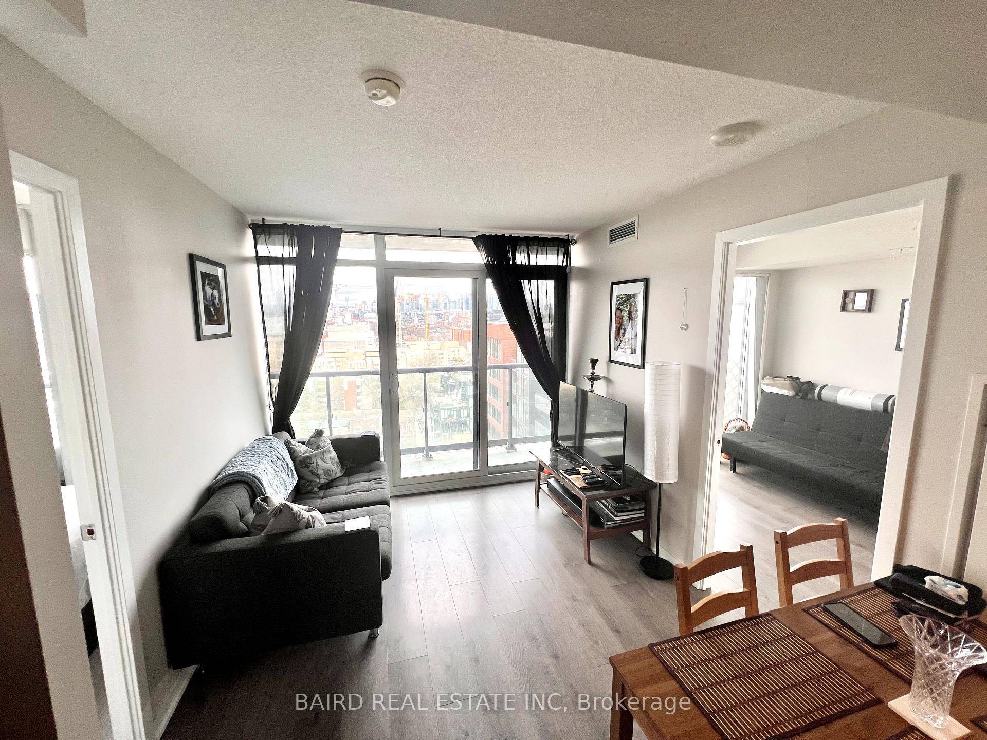 Gorgeous wide open East Views of the CN Tower and Downtown Core from Toronto's Queen West District Little Portugal !