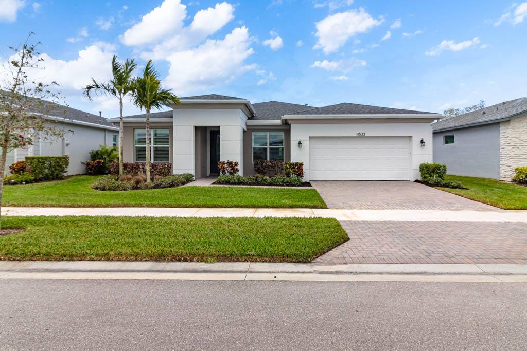 This beautifully crafted residence features an open concept layout that seamlessly connects the living, dining, and kitchen spaces perfect for entertaining or enjoying quiet nights in.