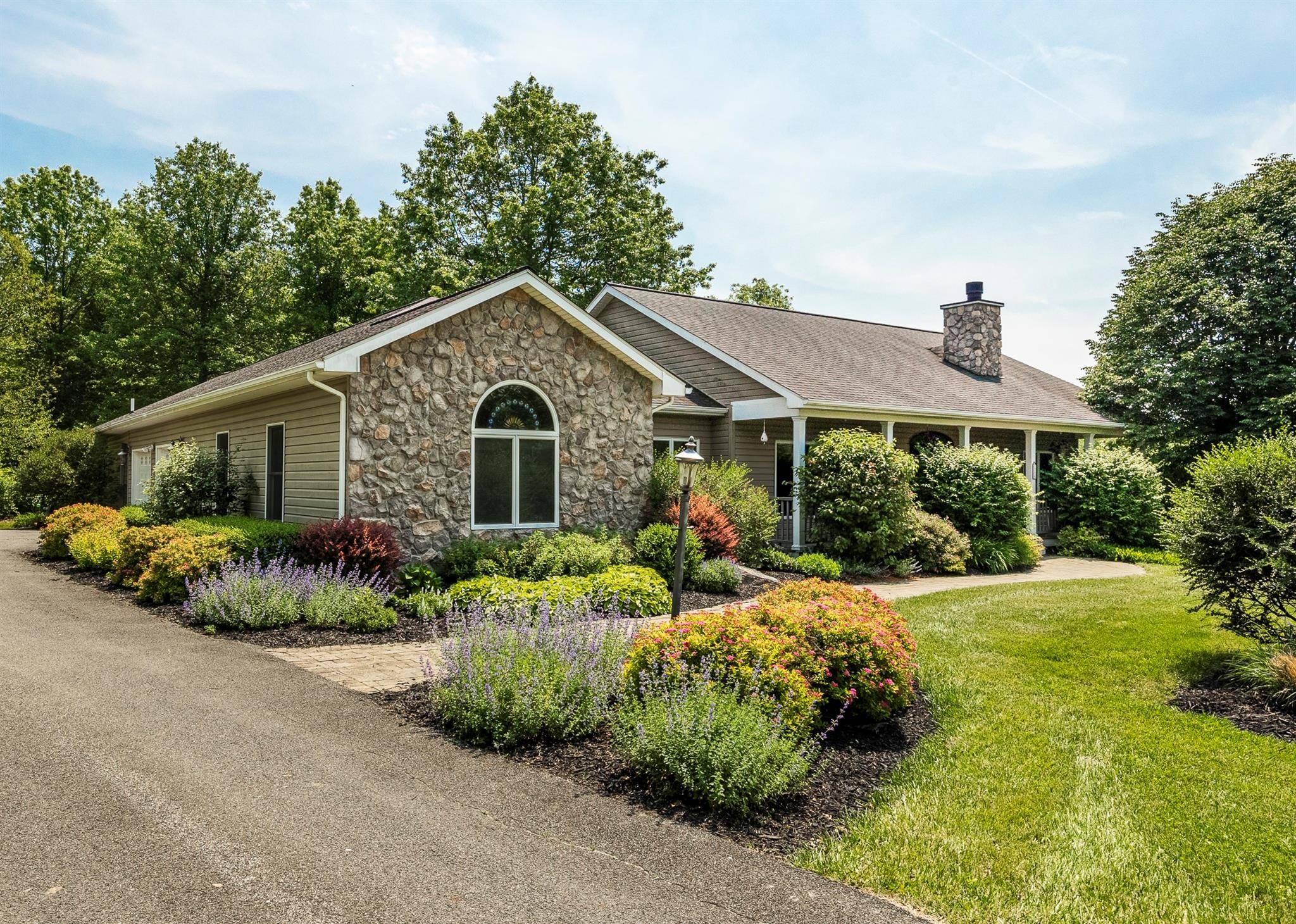 Nestled amidst the serenity of the Clermont countryside, this one of a kind, custom built luxury ranch home presents a perfect blend of sophistication and comfort, designed with the modern ...