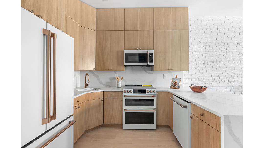 Introducing 112 Luquer Street, nestled in the vibrant heart of Carroll Gardens !