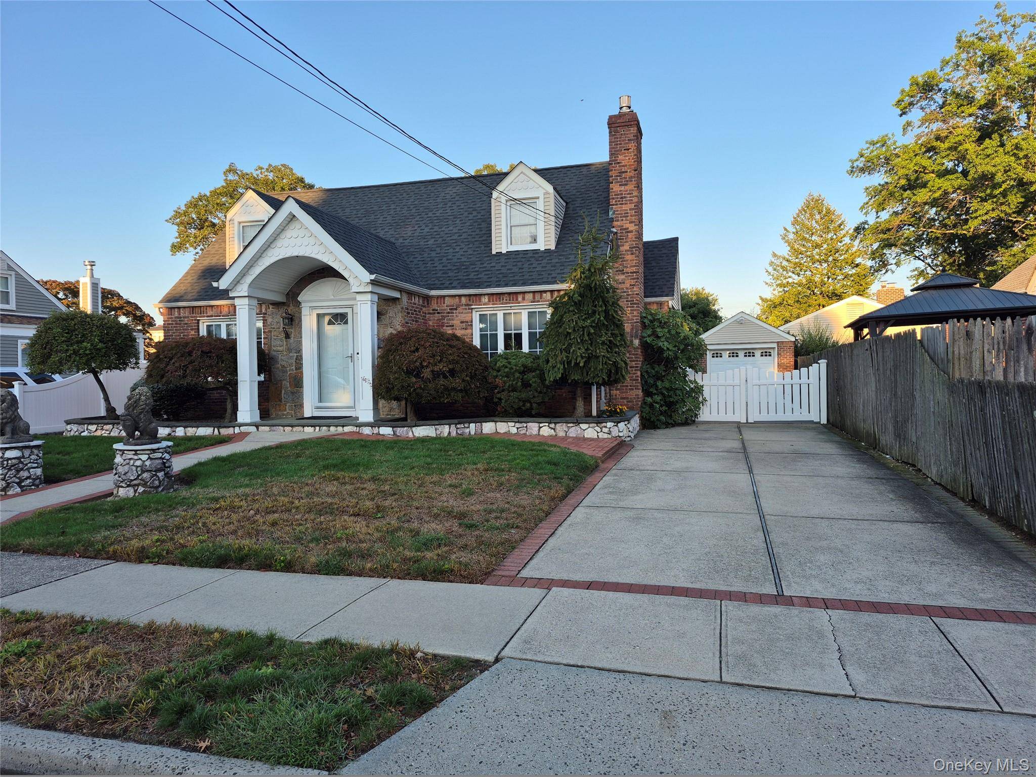 Beautifully Maintained Mid Block Home Featuring Entry Foyer With French Doors Leading To A Formal Living Room With Gas Fireplace, Formal Dining Room, Large Eat In Kitchen With Plenty Of ...