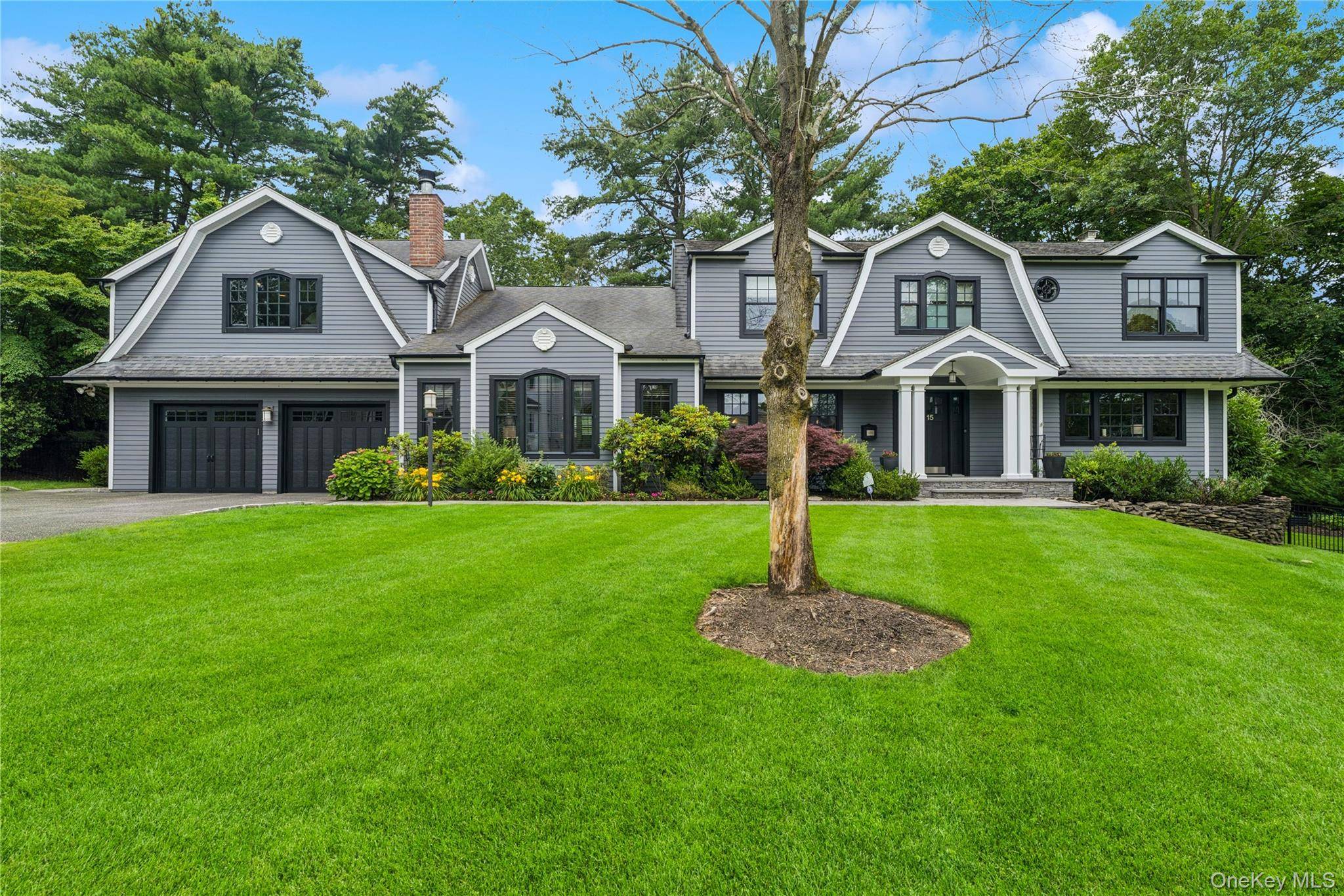 Welcome to a one of a kind, expanded center hall colonial nestled in the desirable Lakeville Estates of East Hills !