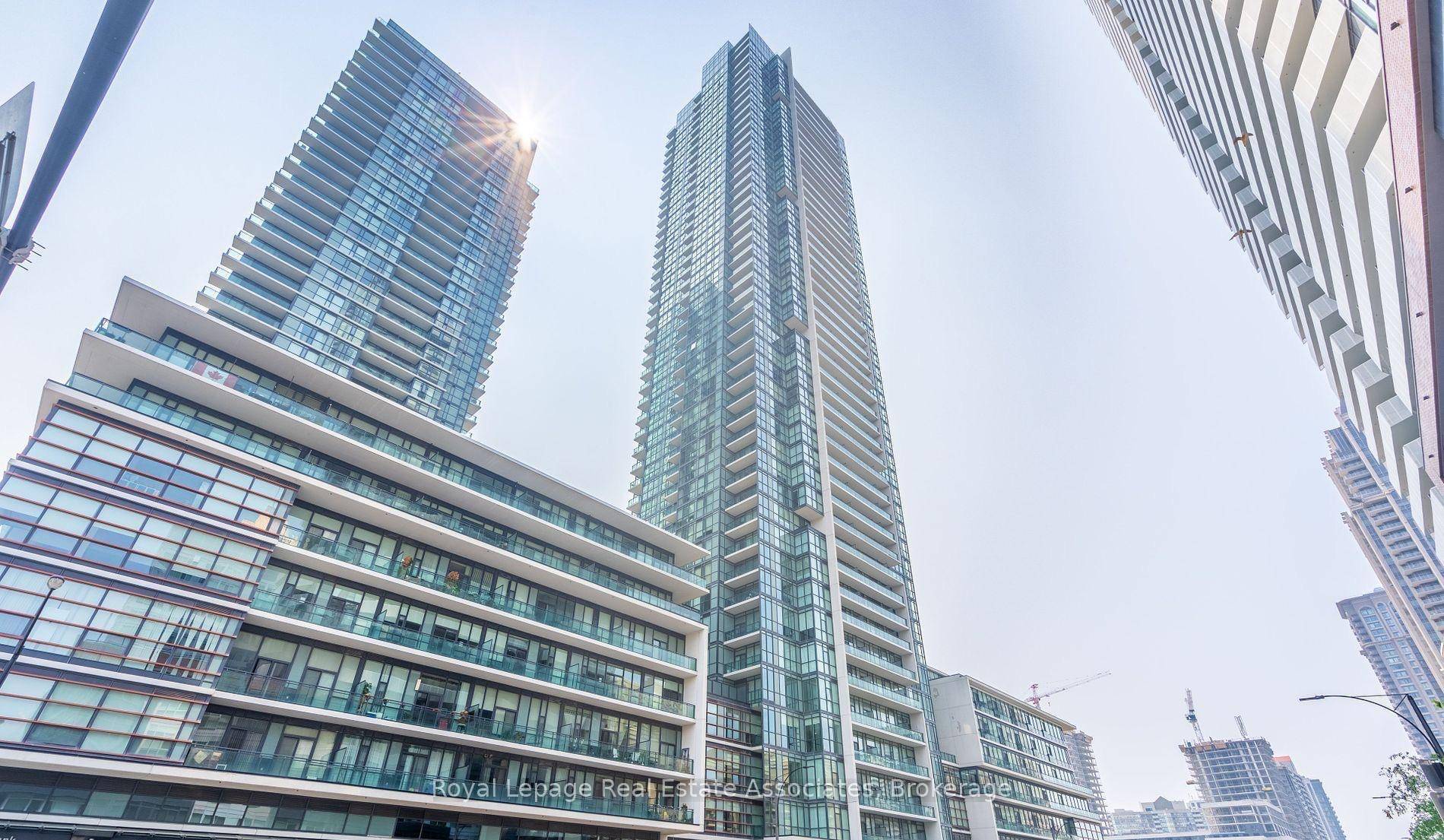 Beautiful and contemporary 1 1 bedroom, 2 bath condo in the heart of Mississauga, featuring an open concept layout with soaring ceilings and a seamless flow between the living, dining, ...