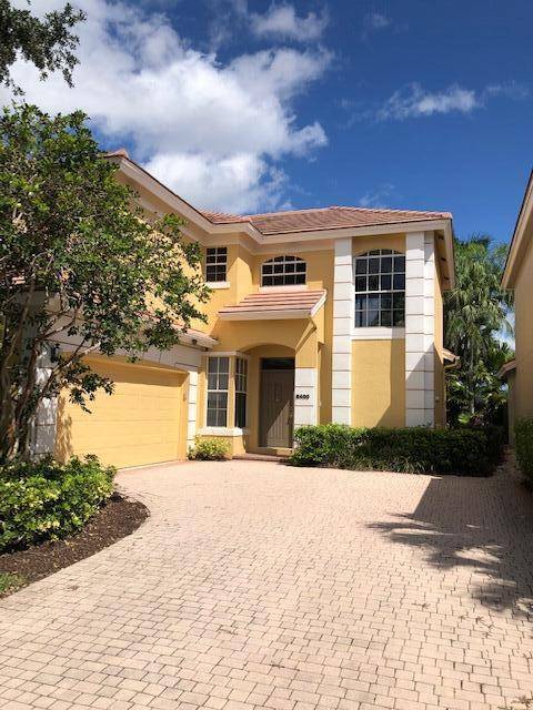 Enjoy golf course living in this beautifully appointed 4 Bed 3 Bath home located in the exclusive Ibis Golf Country Club.