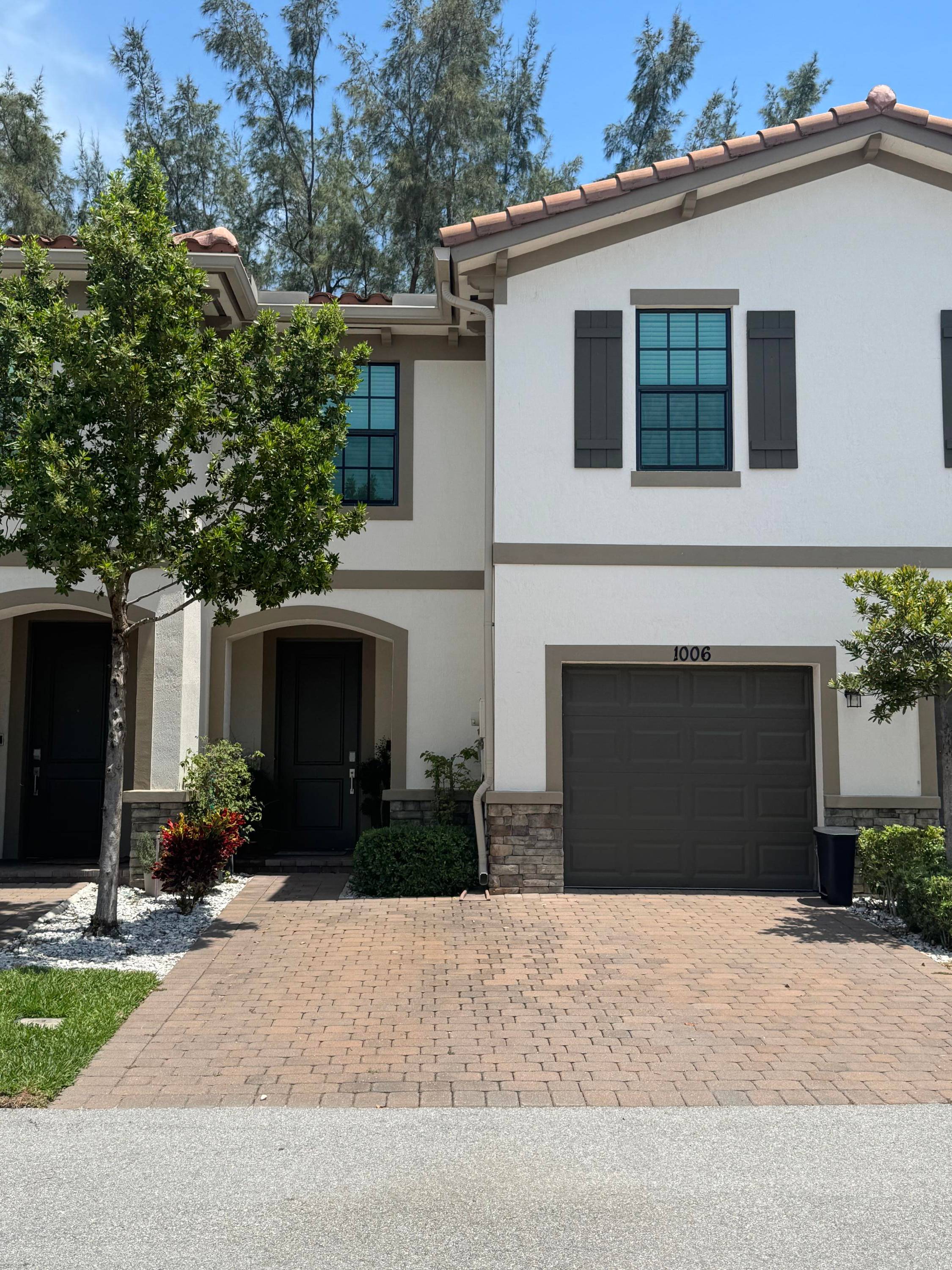 Welcome to your new home in a quiet, gated community just minutes from Palm Beach Gardens.