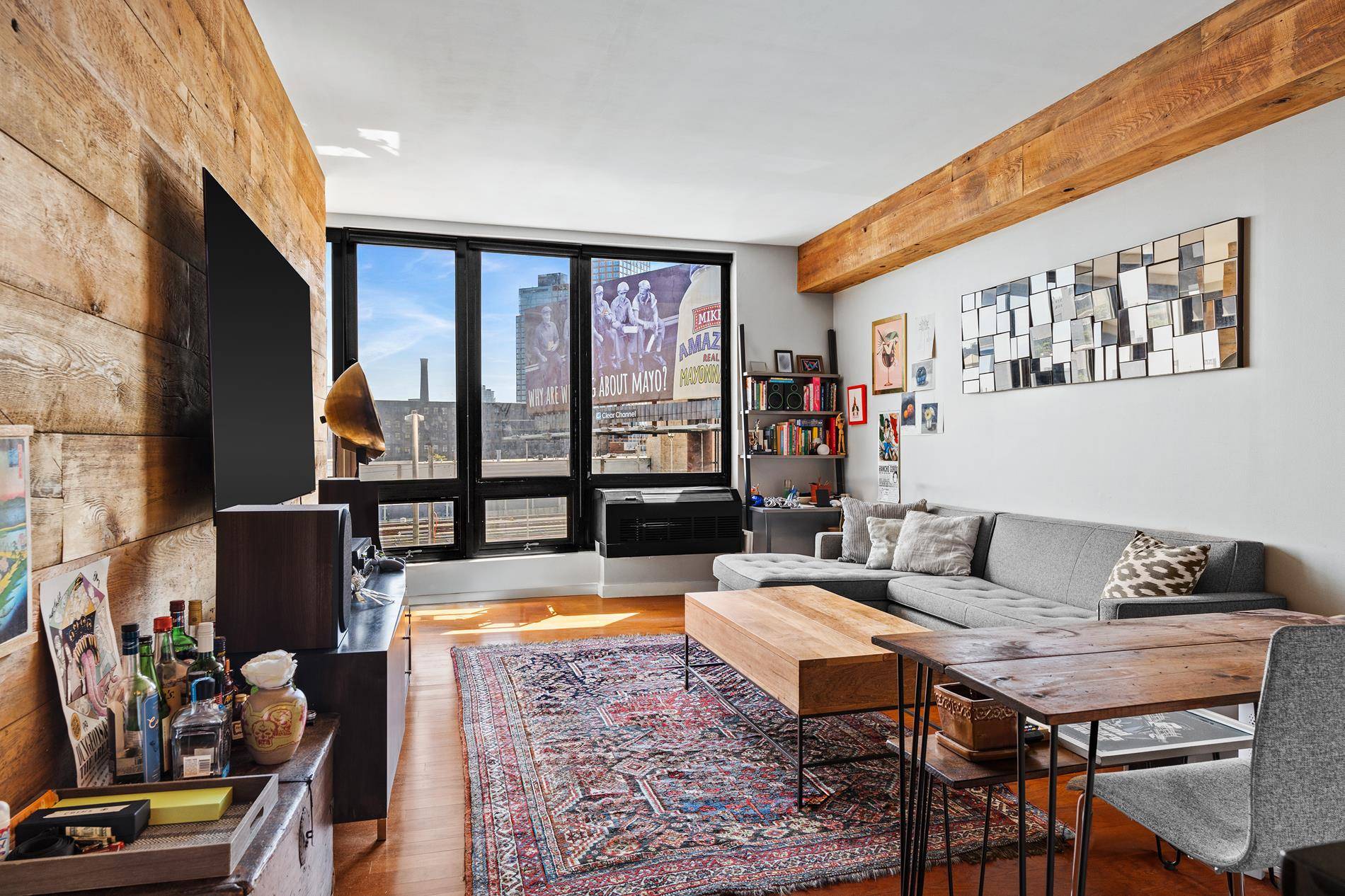 This 692 sq. ft. south facing one bed is at the sought after One Hunter Point Condos.