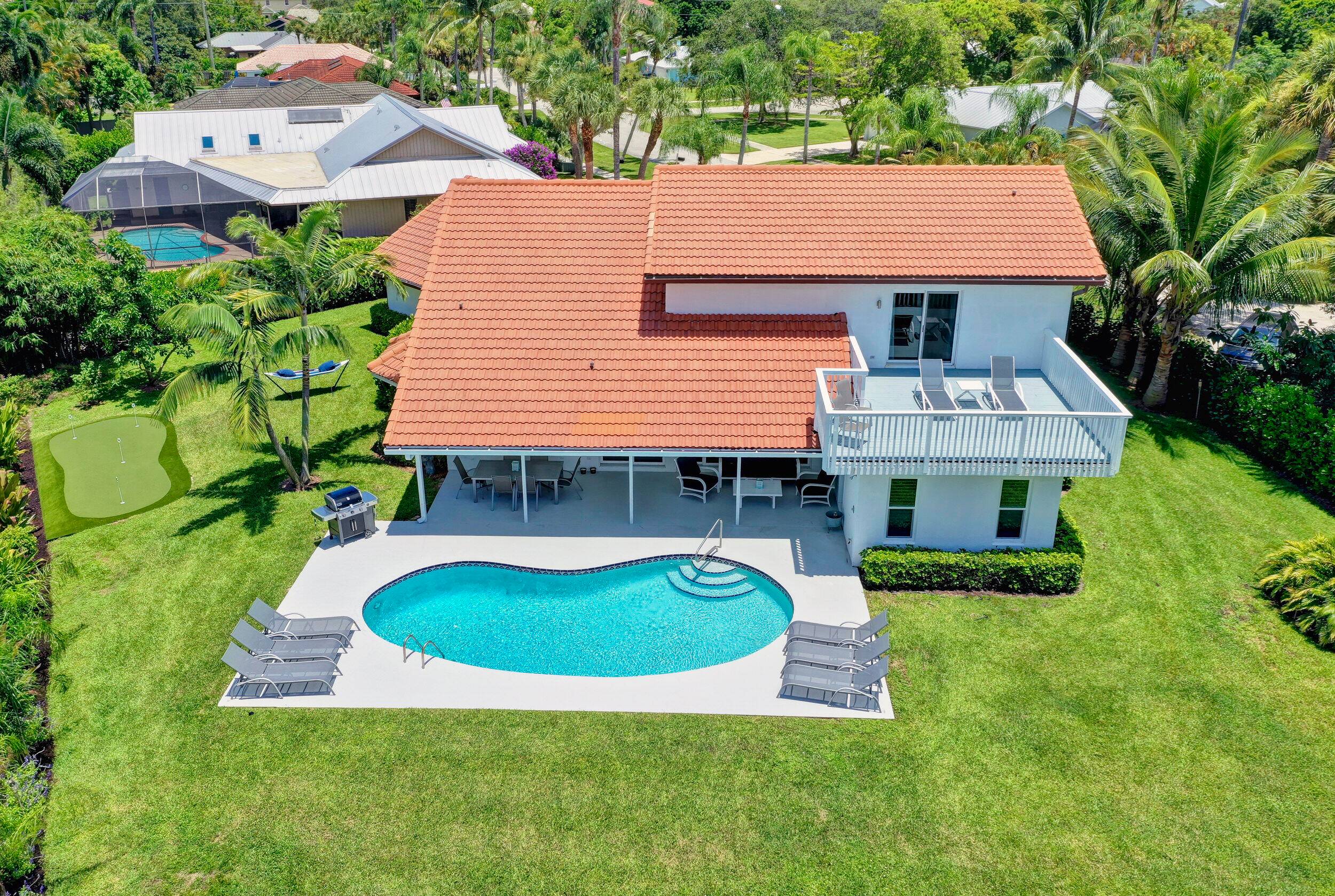 Spectacular waterfront home on the Loxahatchee River with Ocean Access !