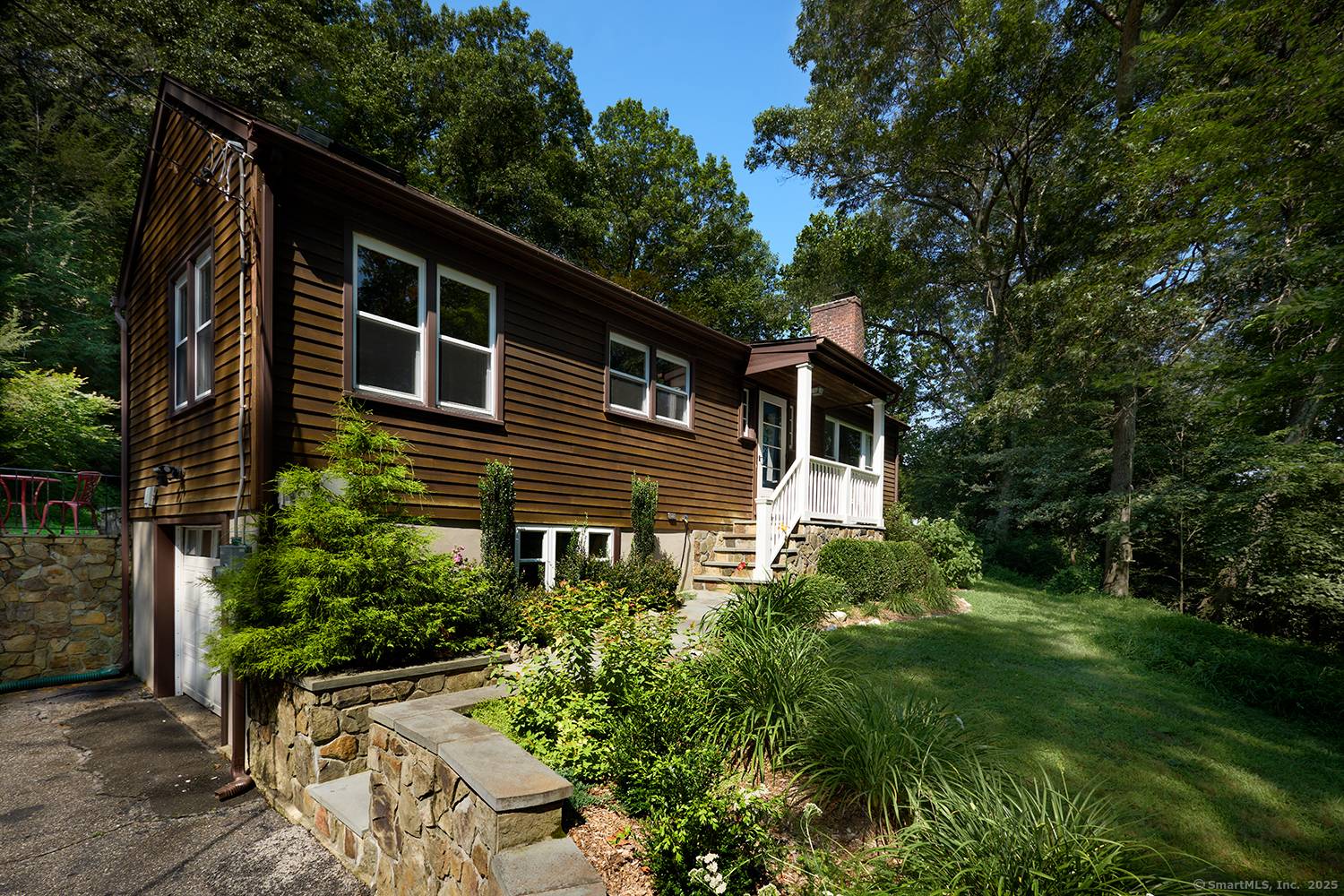 Tucked away in a serene wooded setting, this inviting 1, 532 SF, 3 bedroom, 2 bath ranch offers the perfect blend of modern comfort and relaxed, nature inspired living.