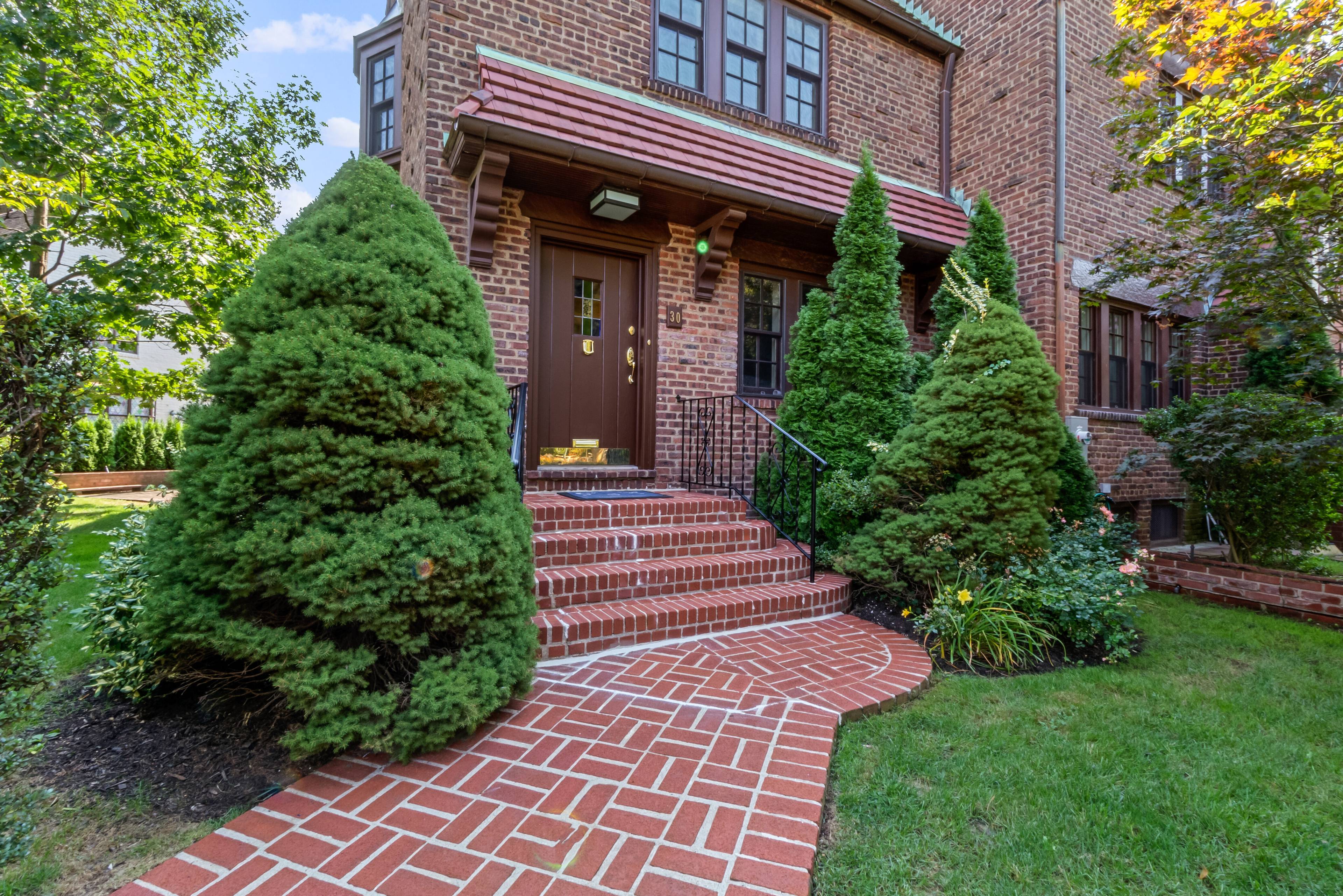 A Rare End Unit Townhouse in a tapestry brick architectural grouping situated on coveted Tennis Place.