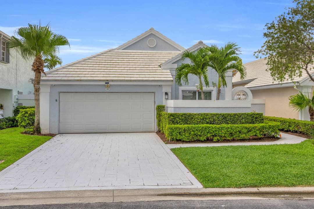 Welcome to this beautifully remodeled 3 bedroom, 2 bath home located in the prestigious PGA National community.