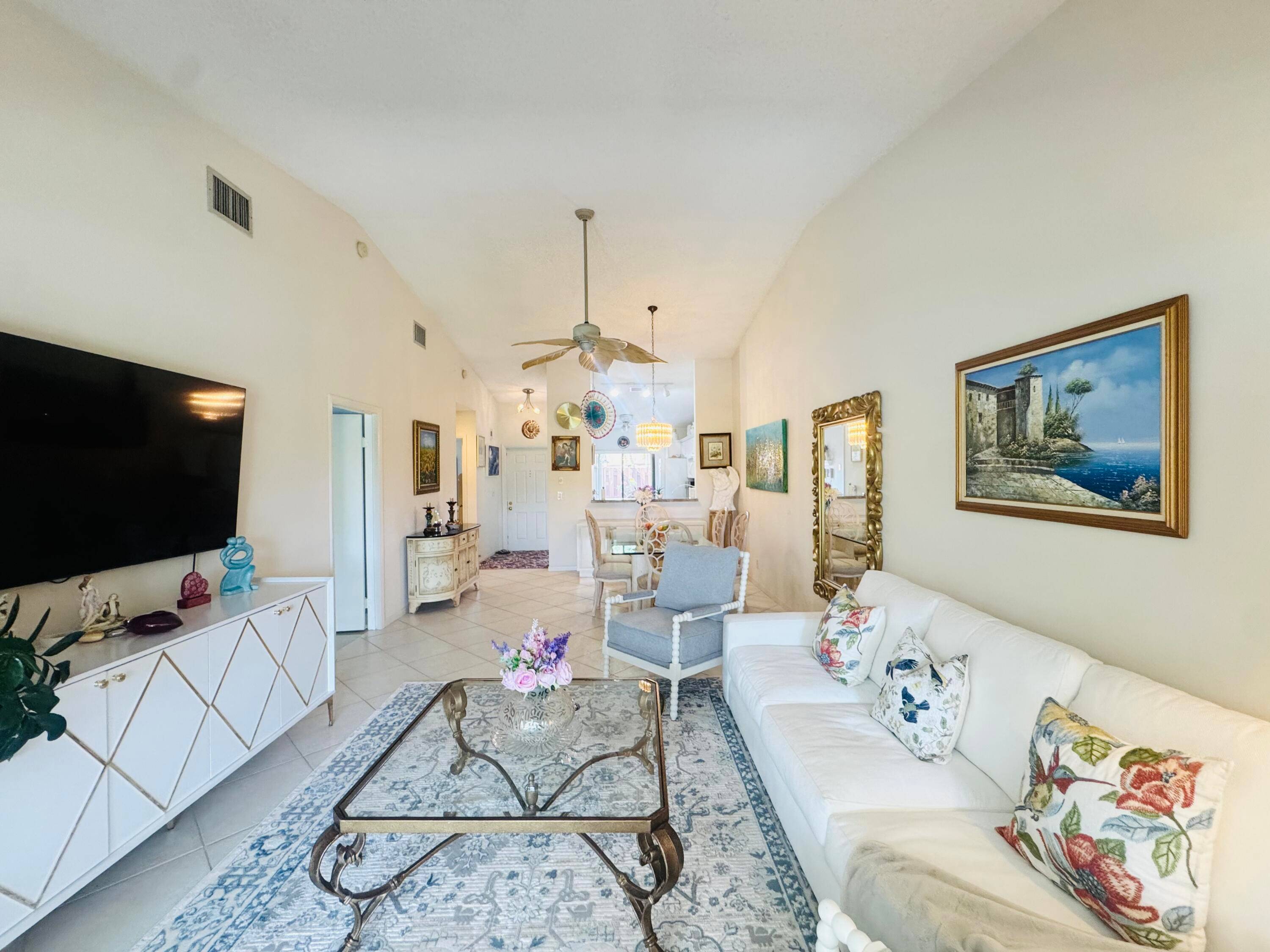Immaculate 2 Bedroom, 2 Bath Villa w 1 car Garage near a private cul de sac in centrally located and well kept community of Oakwood Lakes.