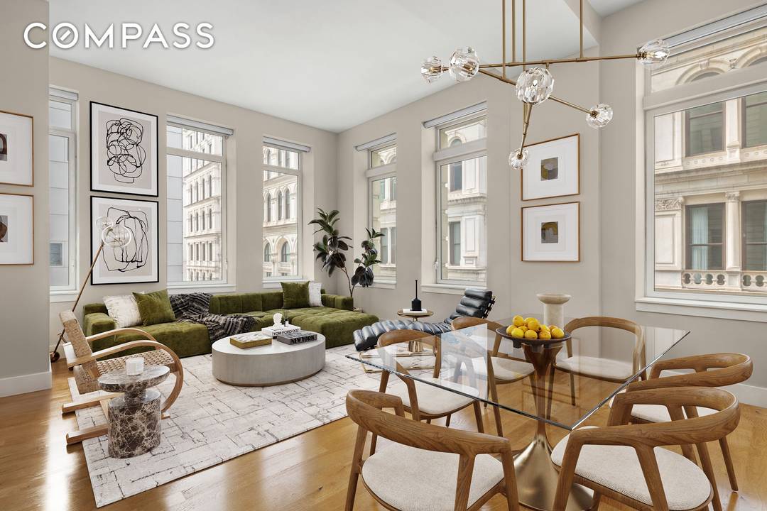 Residence 2E at The Leonard is a meticulously crafted three bedroom, three bathroom loft spanning nearly 2, 000 square feet, bathed in natural light from sweeping south and east exposures.