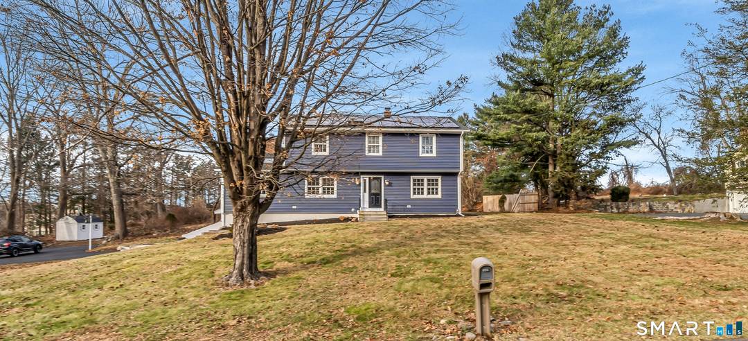 Stunning builder renovated colonial in a highly desirable neighborhood just minutes from the NY border, set on a private, flat 1 acre corner lot.