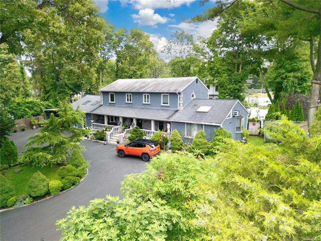 Welcome to your new resort style home located in the heart of Syosset, Long Island.