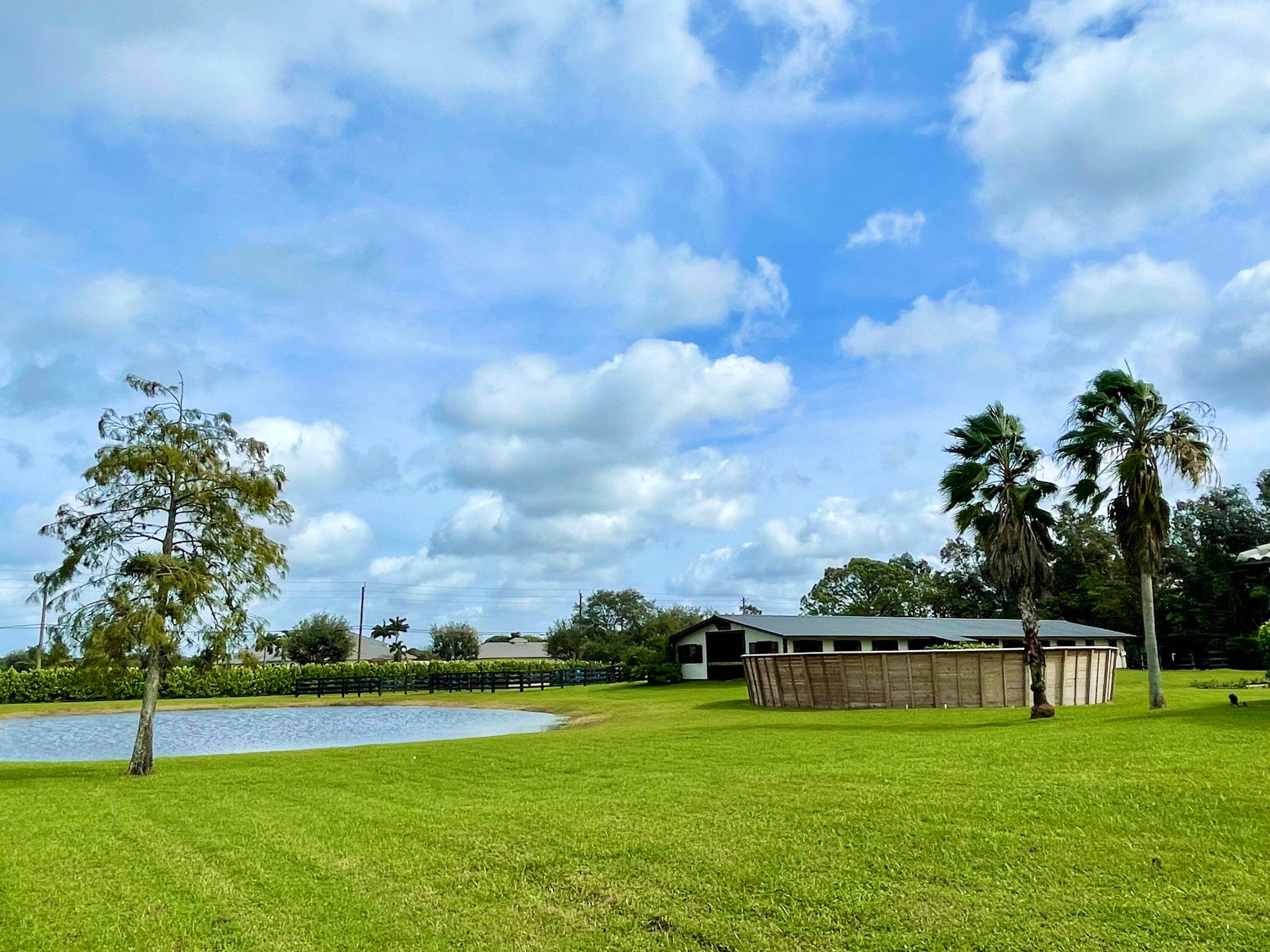 Dry stalls available at this recently renovated 16 stall center aisle barn on 5 acres with a 205x85 Covered mirrored, Ebb Flow arena that's tall enough for Jumpers and a ...