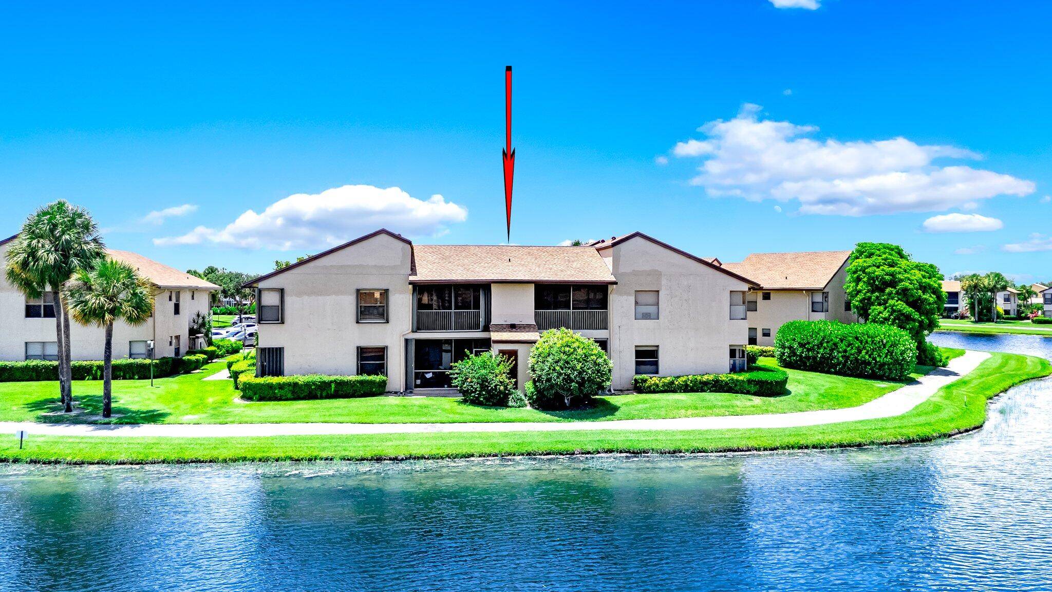 Welcome to this spacious corner unit with lake views from every room.