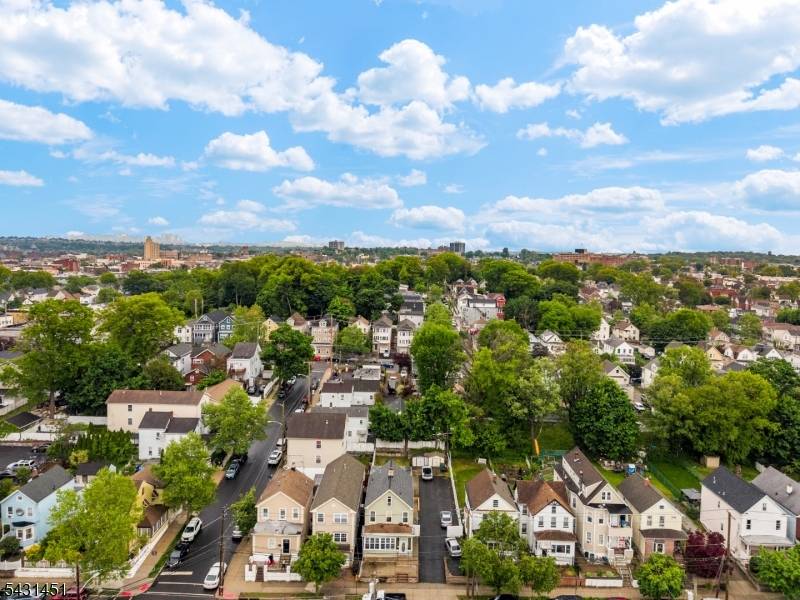 Exceptional multi family opportunity offering 4 levels of living space on an oversized 50x125 lot with a huge driveway providing ample parking.