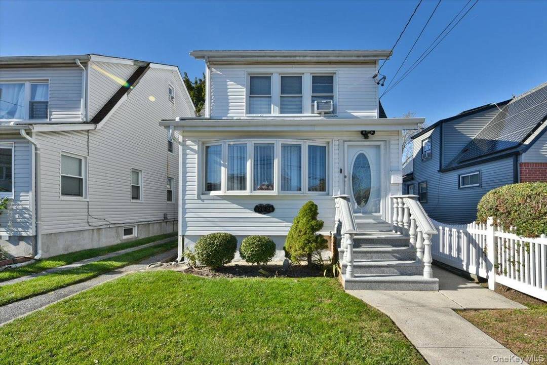 Welcome to 120 20 194th Street a beautifully maintained home that blends modern updates with everyday comfort.