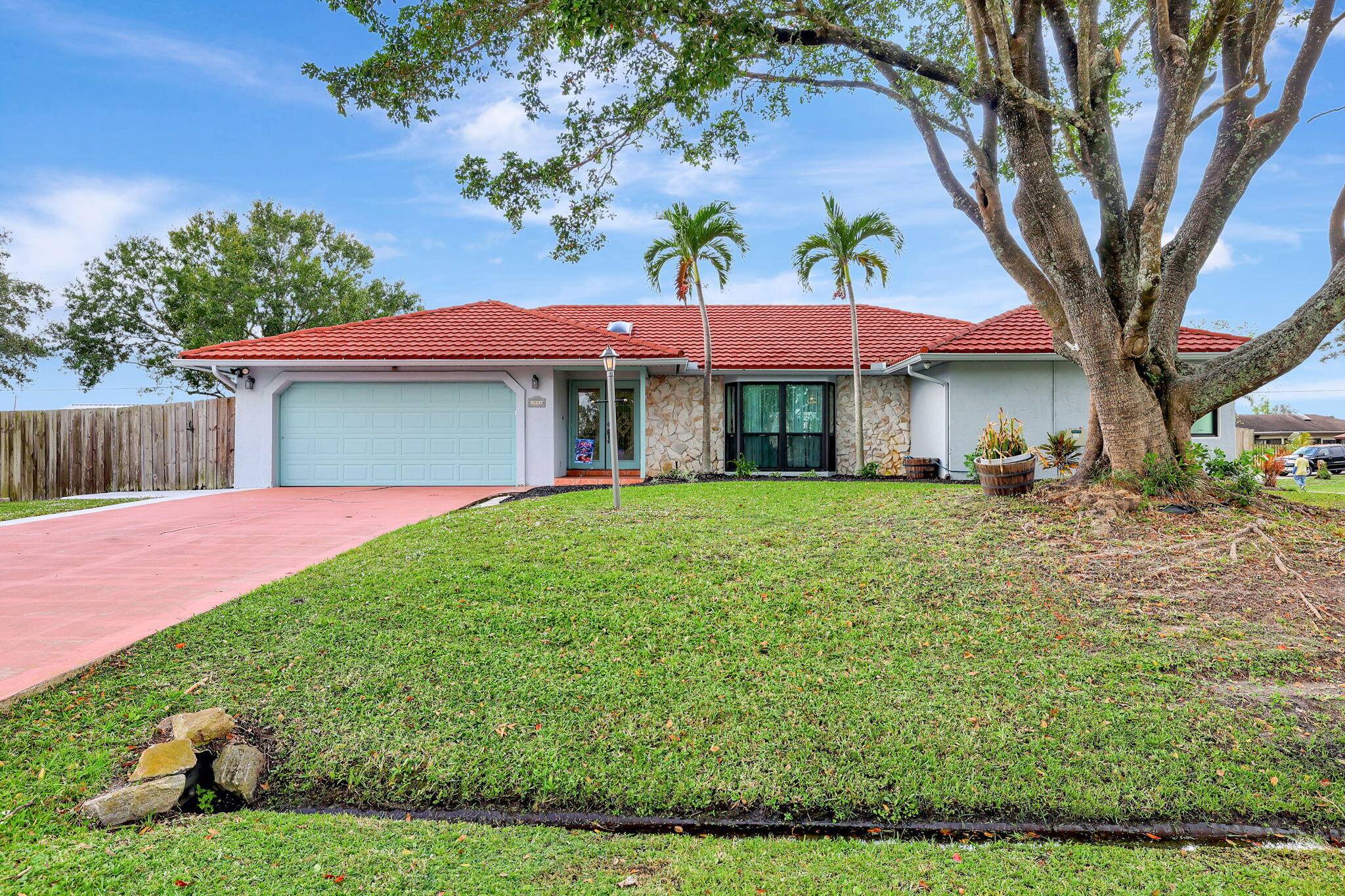 HIDDEN GEM ! FULLY FENCED DOUBLE LOT ON CORNER 1 2 ACRE TOTAL !