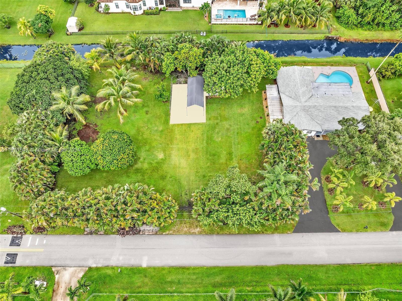 Indulge in the epitome of luxury living in this prestigious heart of Plantation Acres Estate, Where opulence set meets versatility.