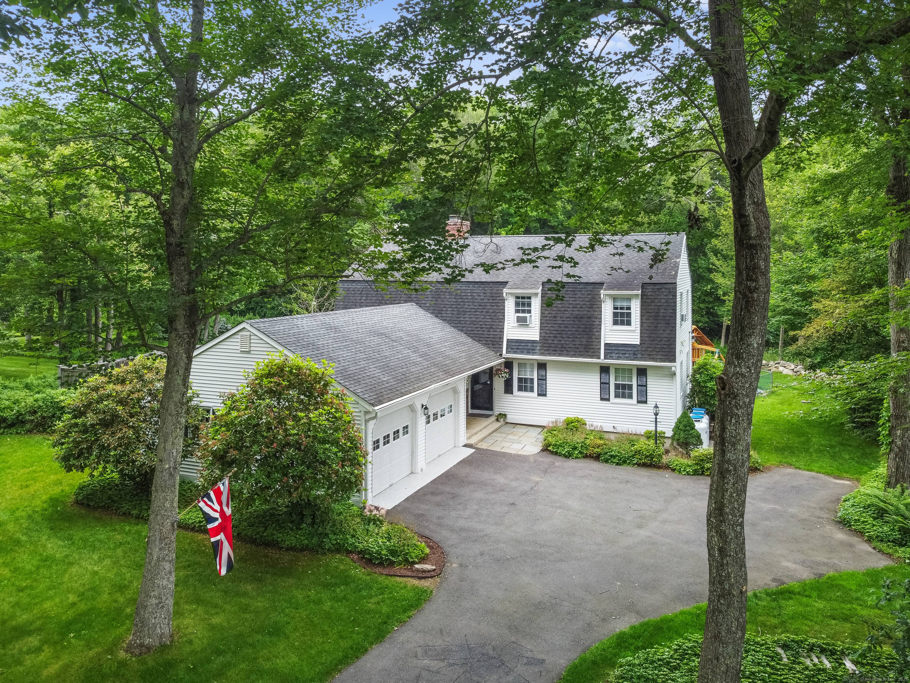 Captivating Colonial Home with Heated Saltwater Pool, Sunroom, and NEW Heating System !