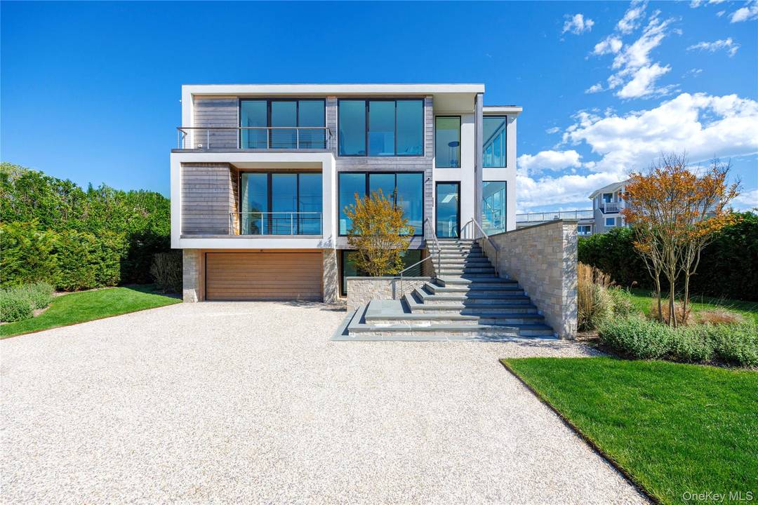 Deluxe Dune Road Oceanfront Experience the ultimate Westhampton Beach getaway in this impeccably maintained modern gem, where refined design, luxurious amenities, and graciously scaled, exciting spaces elevate every gathering.