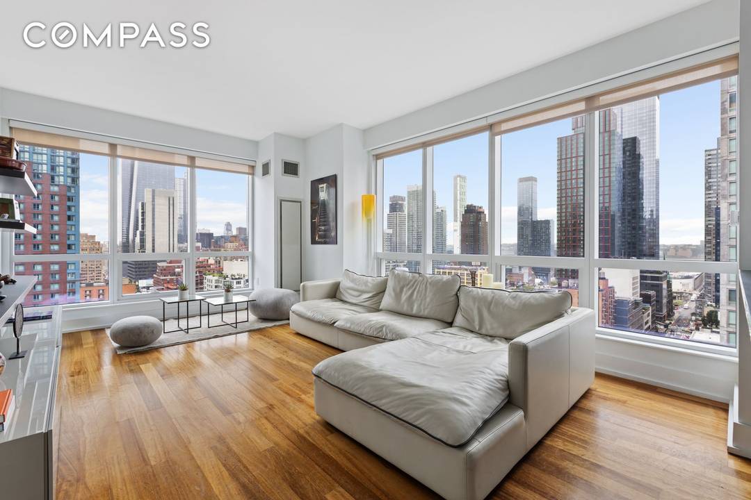 This stunning sun soaked 2 bedroom, 2 bathroom corner apartment in The Orion building boasts a premier Midtown Manhattan location.