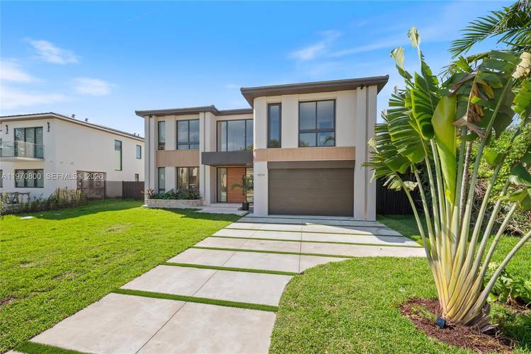 New construction two story single family home featuring 5 bedrooms and 6 bathrooms, offering 3, 904 SF of living space and a two car garage.