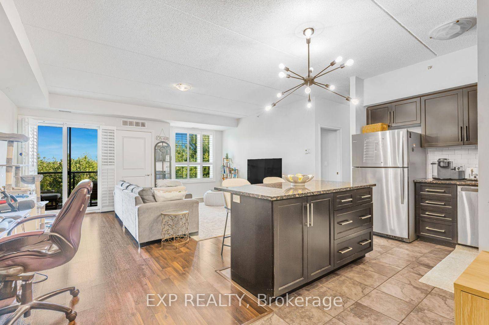 Welcome to this exquisite ground floor condo, a haven of luxury spanning approximately 1, 100 square feet.