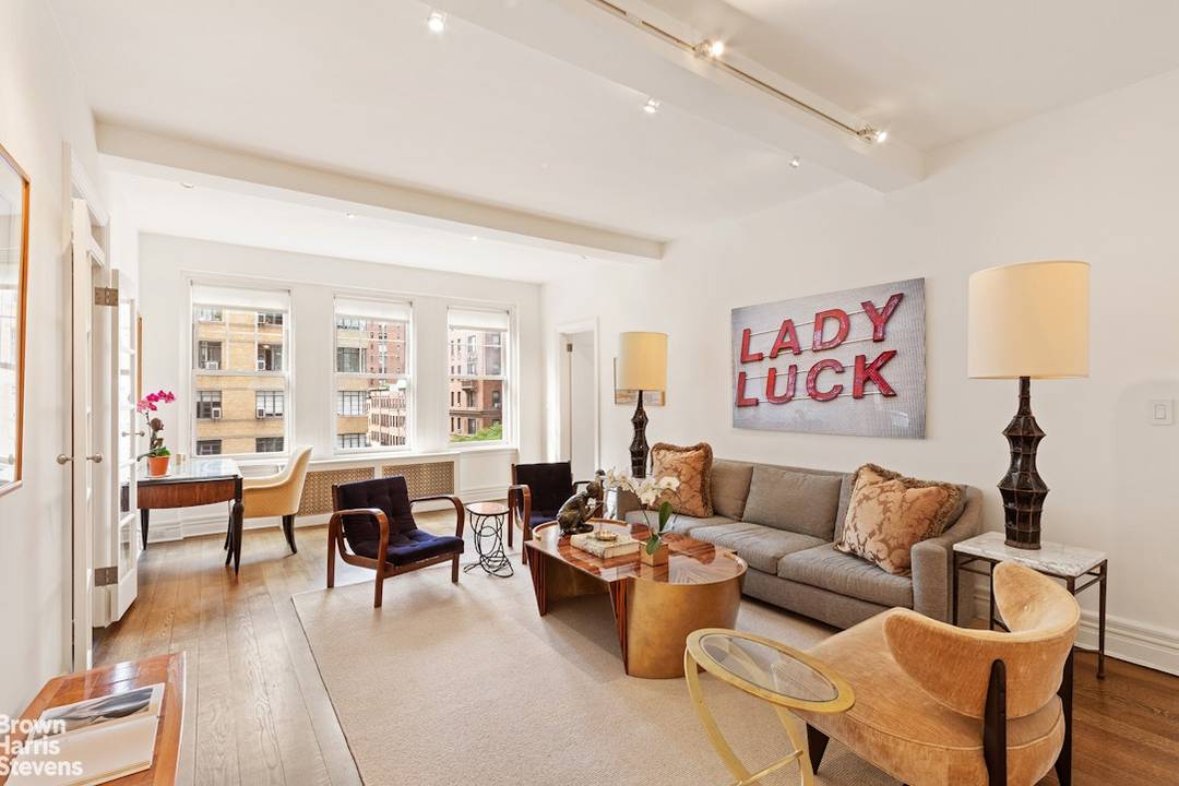 A thoughtfully renovated two bedroom, two bath home with mid century modern sensibility in one of the Upper West Side's most sought after cooperatives.