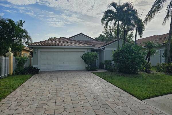 3br 2ba 2 car LAKEVIEW HOME HIGHLY SOUGHT AFTER MODEL IN GUARD GATED COMMUNITY INSIDE ANDROS ISLE WITHIN PBC ''A RATED SCHOOL SYSTEMS.