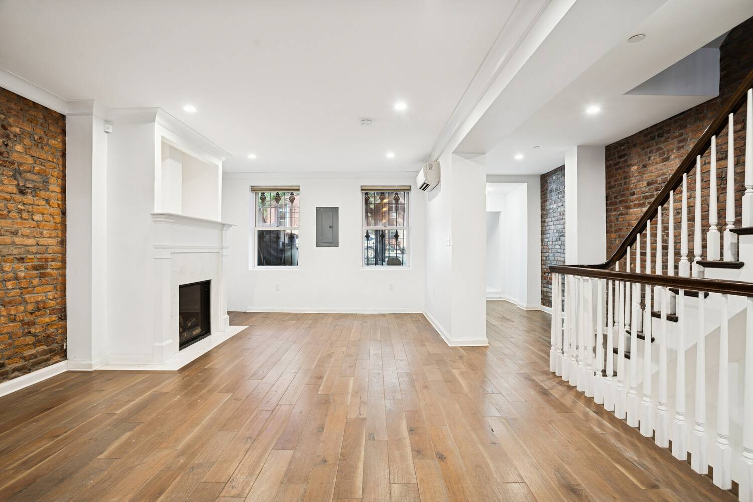 Welcome to 445 Franklin Avenue, a beautifully reimagined townhouse triplex that artfully balances historic charm with modern style.