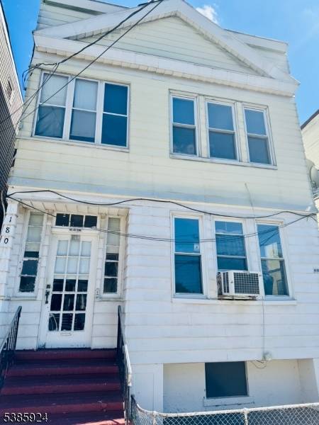 Great 2 family home with new roof, new driveway, new boiler.