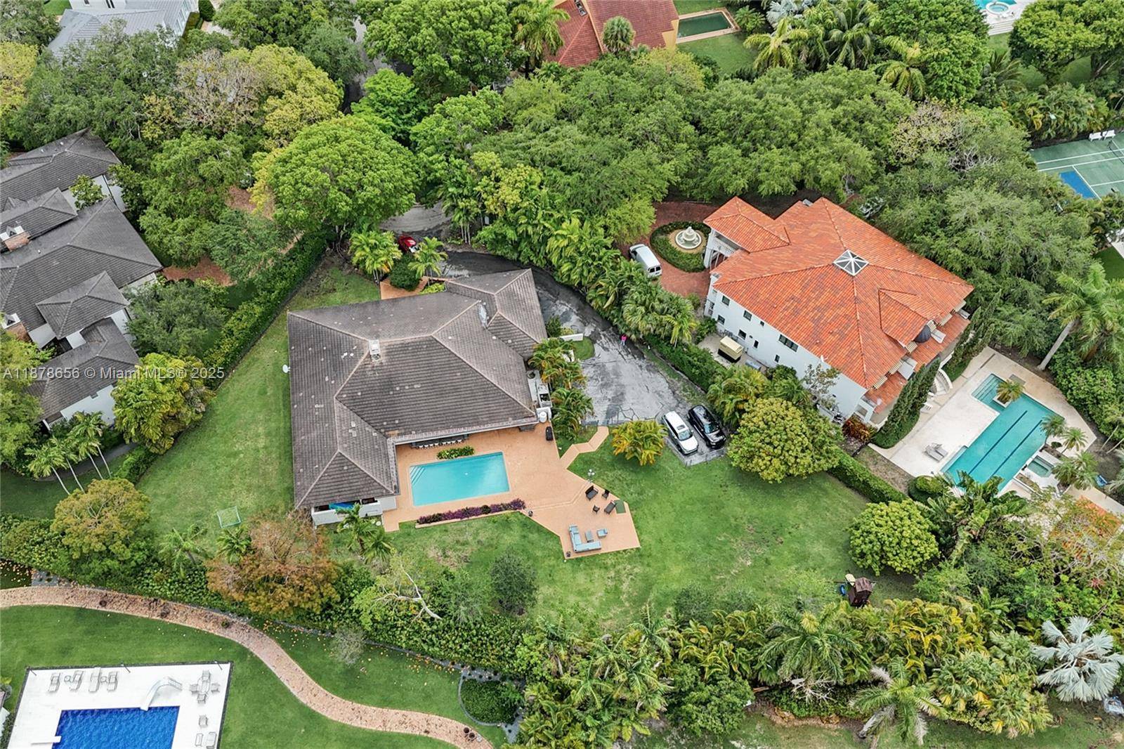 Located in Phase 1 of Cocoplum, this home sits on a large 31, 200 SF Lot at the end of a private cul de sac.