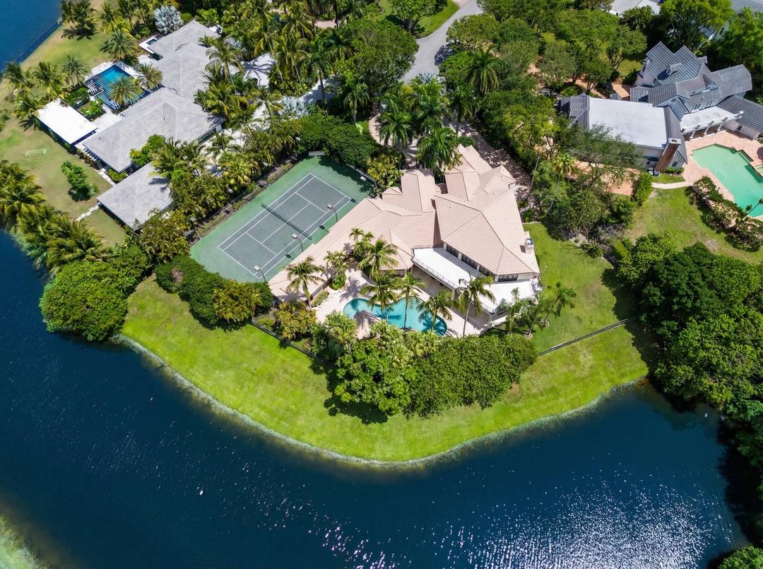 Nestled on a serene cul de sac within the prestigious gated community of Long Lake Estates, this sprawling lakefront estate on more than an acre offers the ultimate in luxury ...
