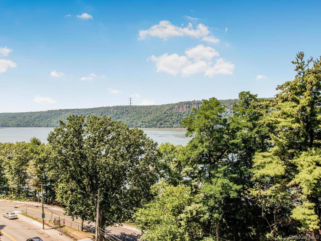 Wake up to sweeping Hudson River views in this move in ready condo at Riverwatch !