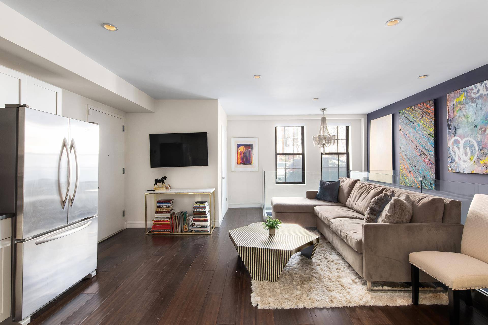 LOW MONTHLIES ! ! ! At nearly 1, 000 square feet, this versatile bi level home boasts two full bathrooms, a washer dryer, high ceilings, wide plank solid wood floors, ...