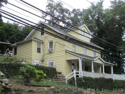 One of a kind property, dwellings built by owners' grandfather.