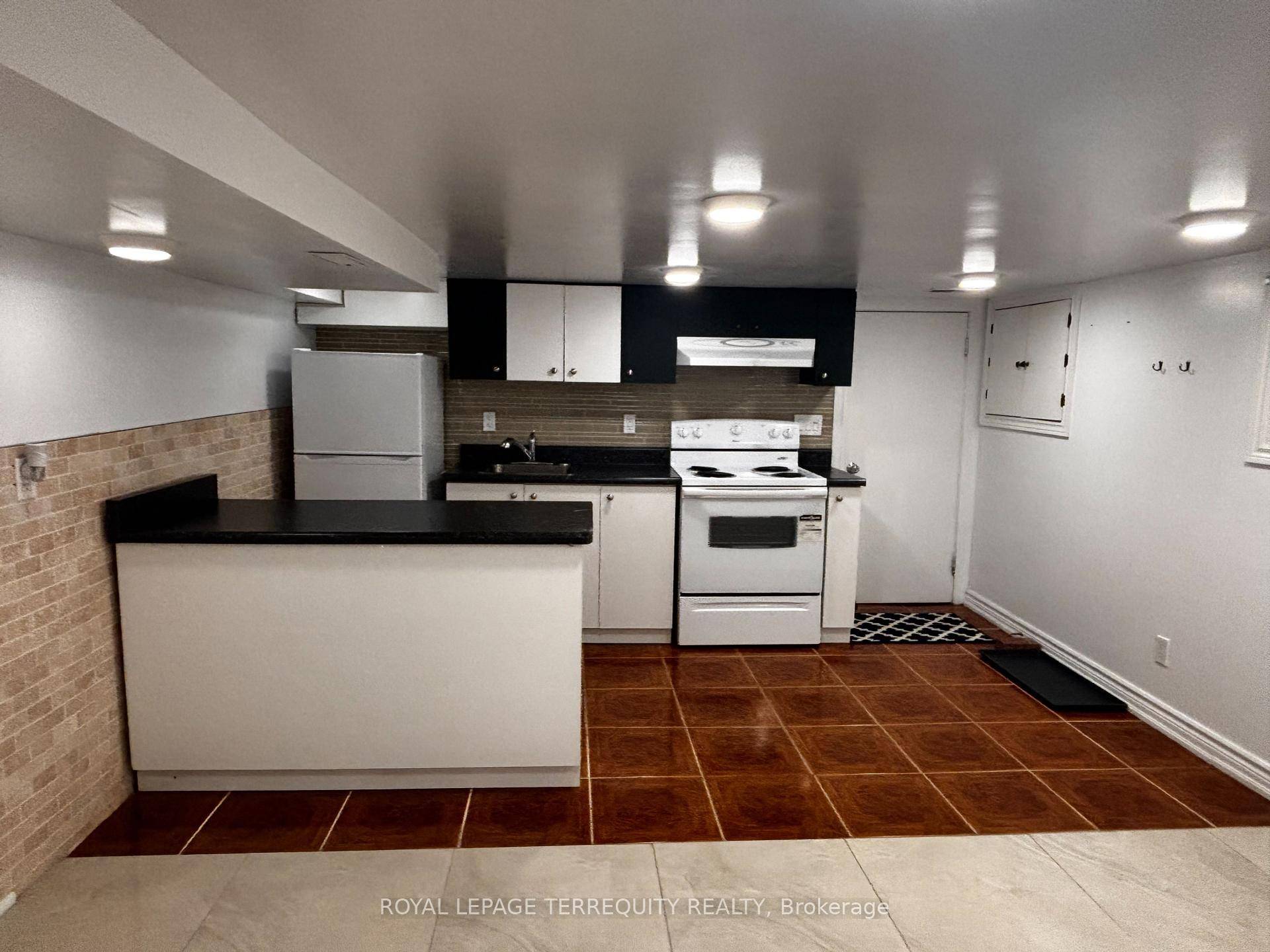Clean, crisp and bright can describe this one bedroom basement that includes heat amp ; hydro boasts high ceilings.