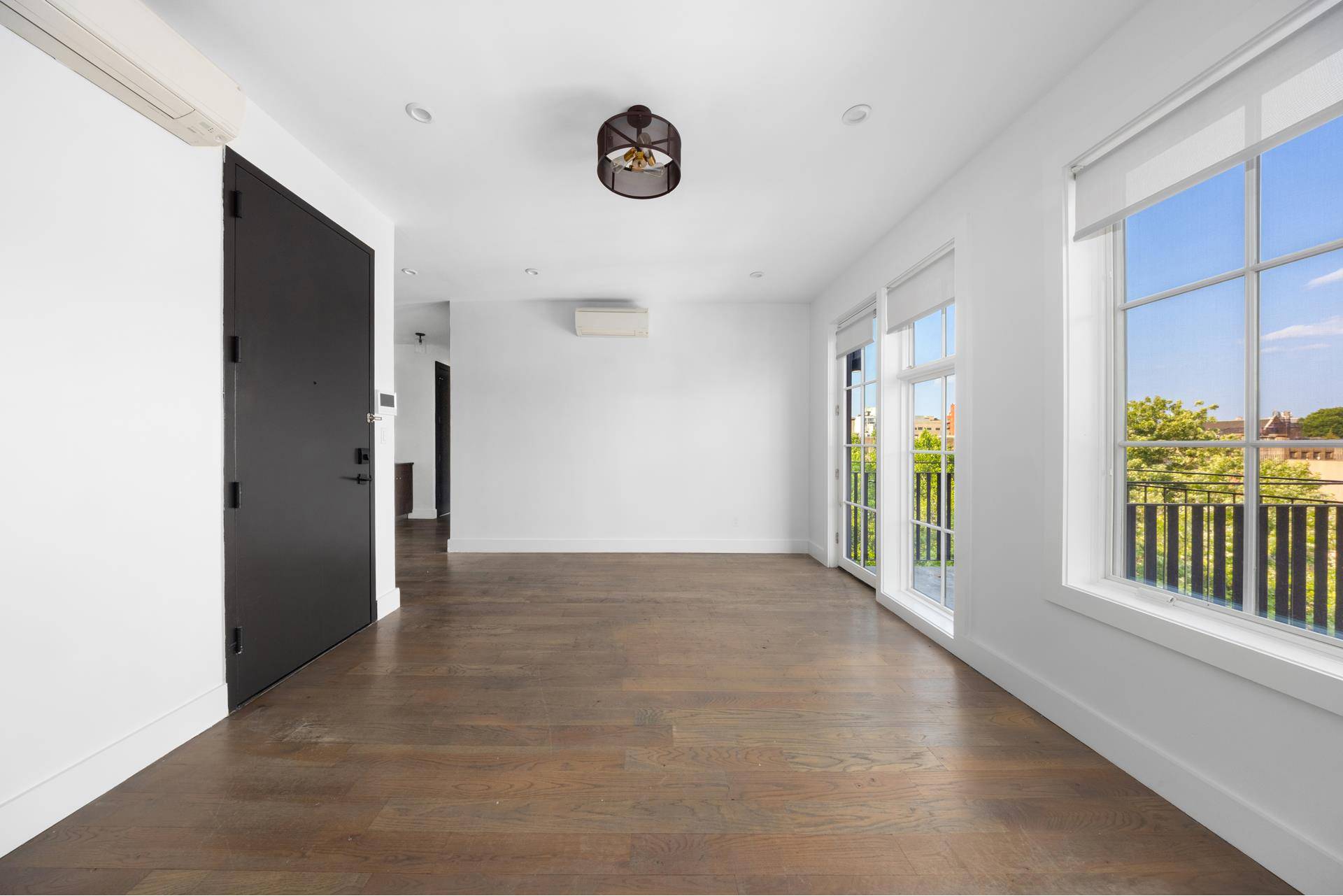 Residence 5B is a pristine home in a new luxury development, offering refined finishes and modern comfort throughout.